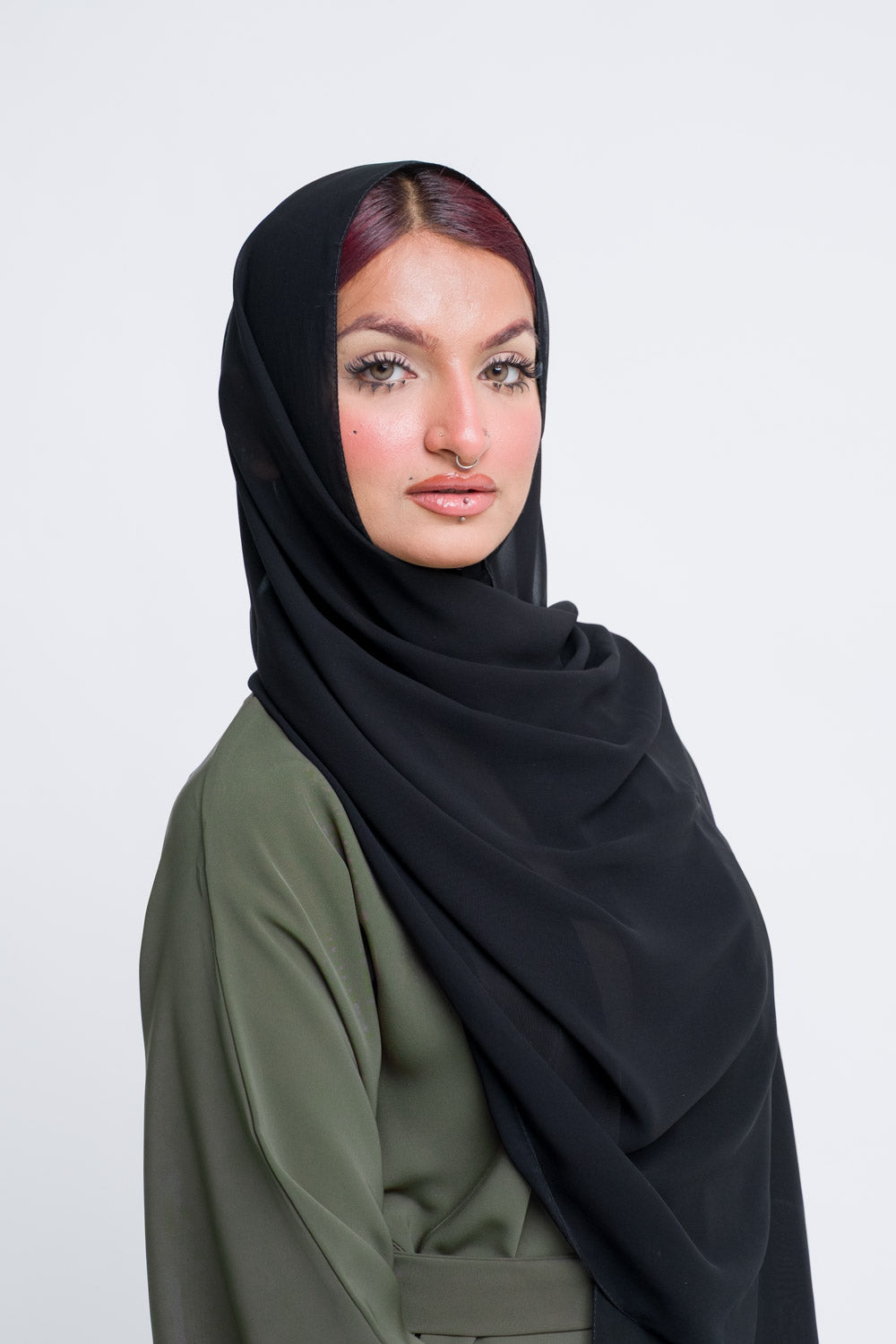Lightweight black hijab in chiffon for everyday modest wear.