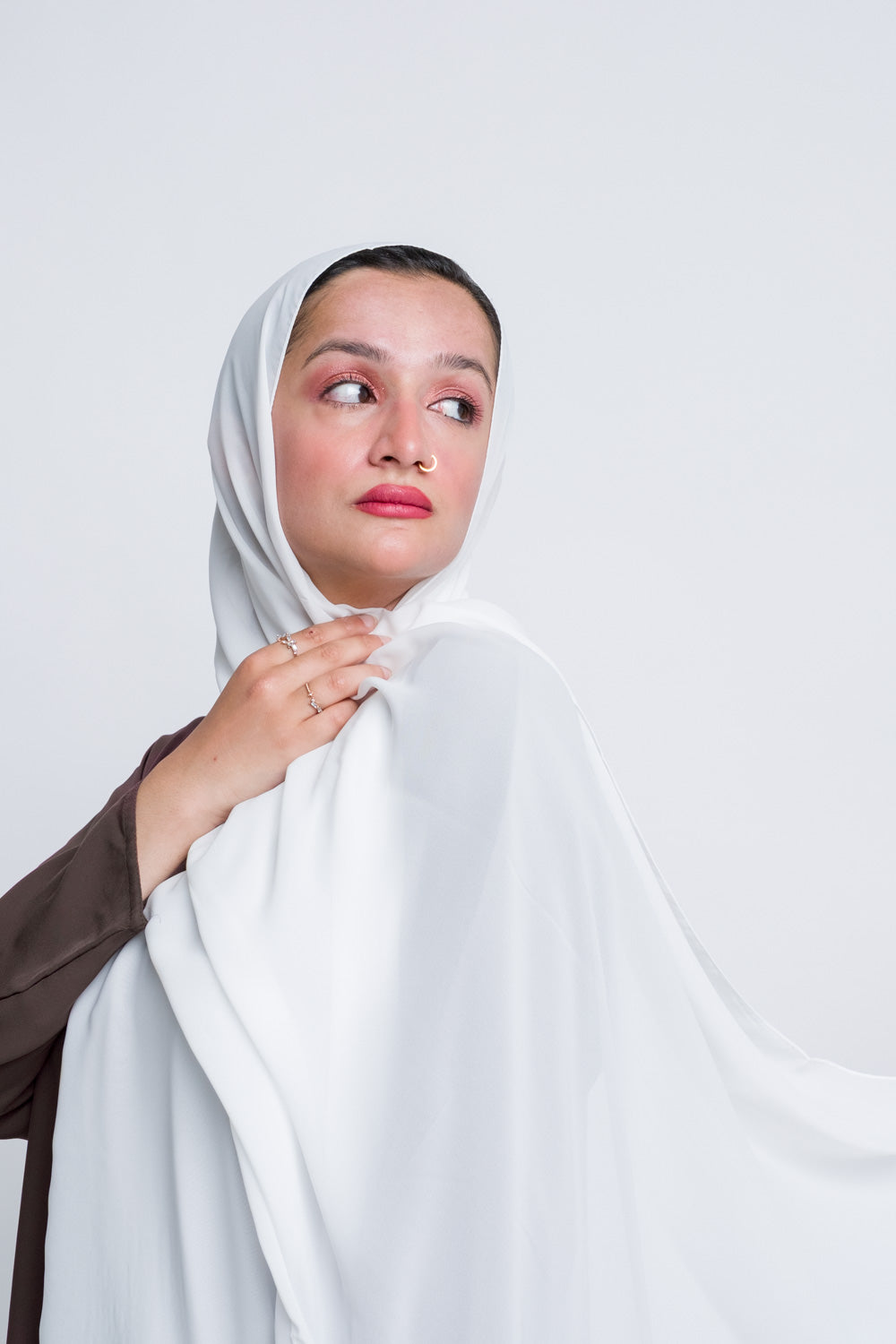 Premium white chiffon hijab in soft, breathable fabric.