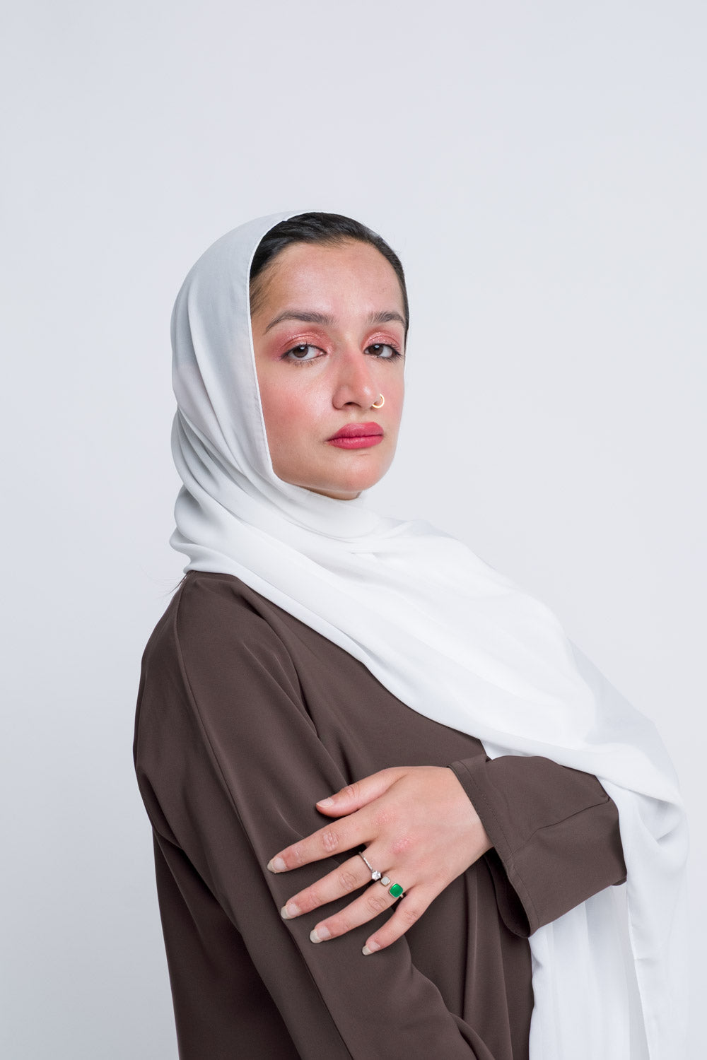 White chiffon hijab for weddings, Eid, and clean modest looks.